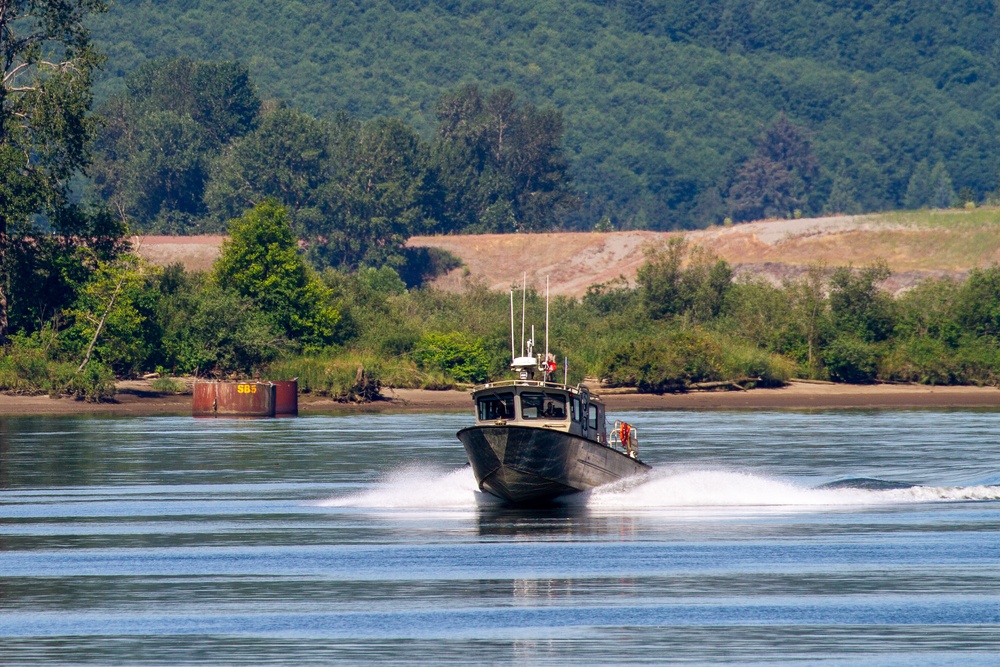 U.S. Army Corps of Engineers Portland districts’ hopper dredge, Essayons, launch boat.