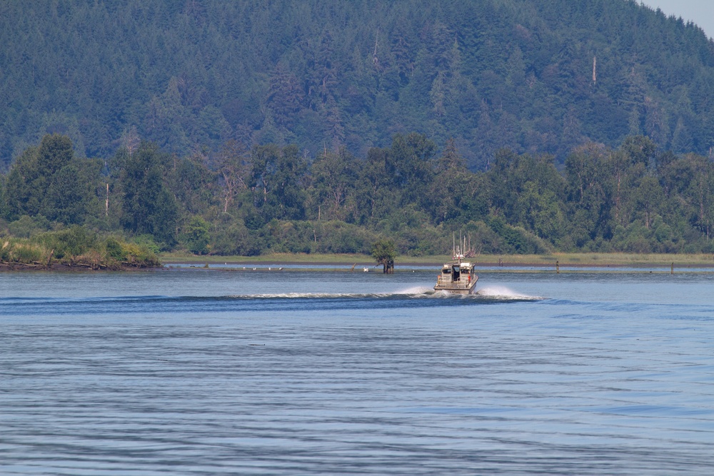 U.S. Army Corps of Engineers Portland districts’ hopper dredge, Essayons, launch boat.