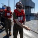 U.S. SAILORS PARTICIPATE IN A RENPLENISHMENT AT SEA