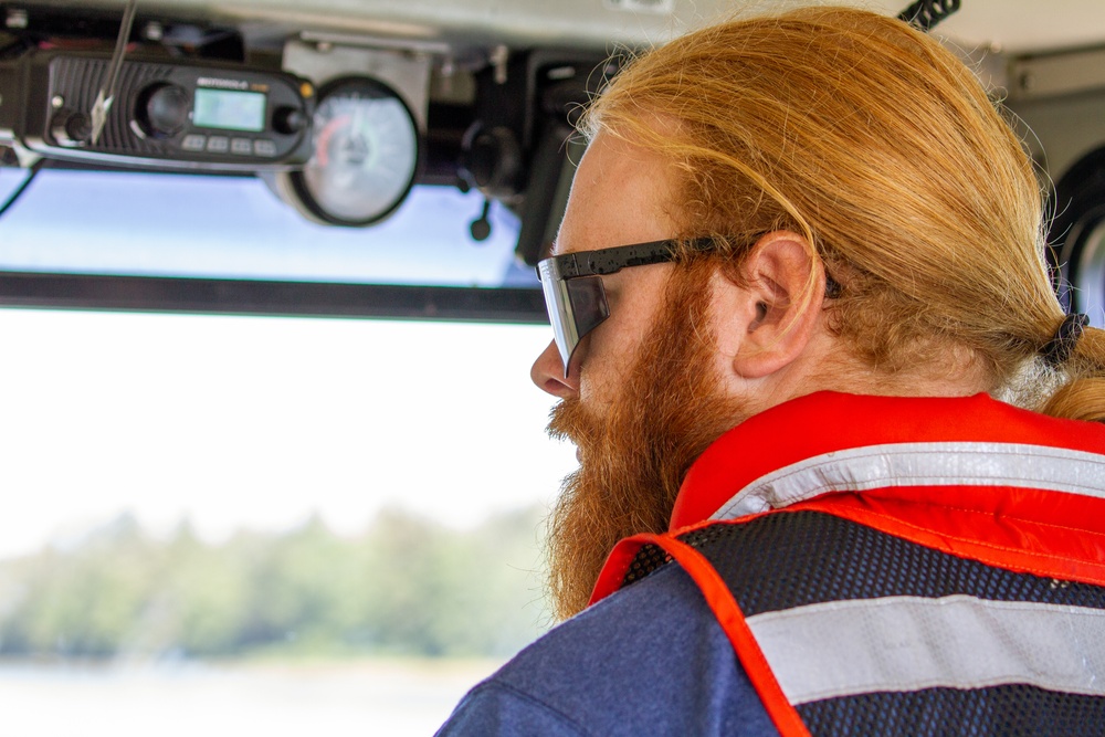 Launch boat captain escorts command group to the U.S. Army Corps of Engineers Portland districts’ hopper dredge, Essayons.