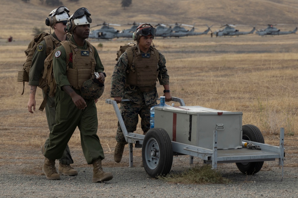 SUMMER FURY 22: Marine Heavy Helicopter Squadron 465 transports Marines and gear to a forward arming and refueling point