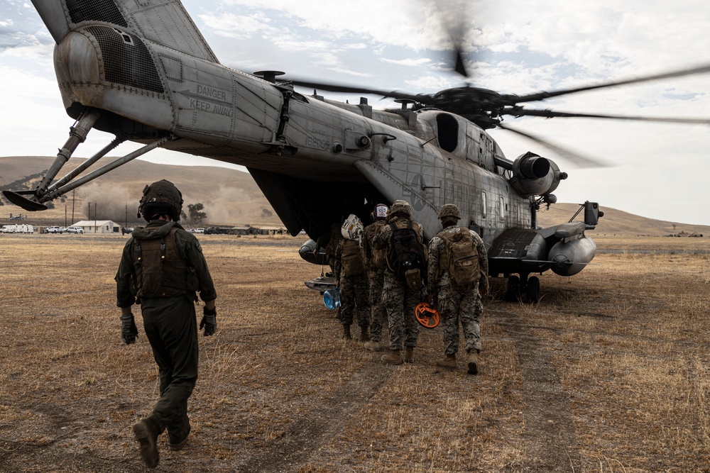 SUMMER FURY 22: Marine Heavy Helicopter Squadron 465 transports Marines and gear to a forward arming and refueling point