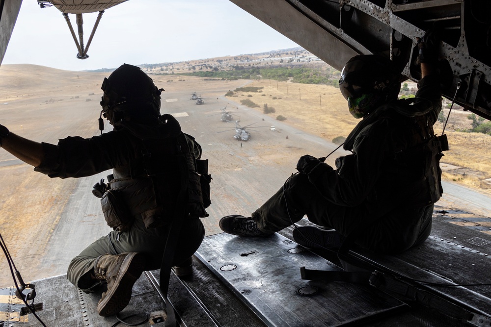 SUMMER FURY 22: Marine Heavy Helicopter Squadron 465 transports Marines and gear to a forward arming and refueling point