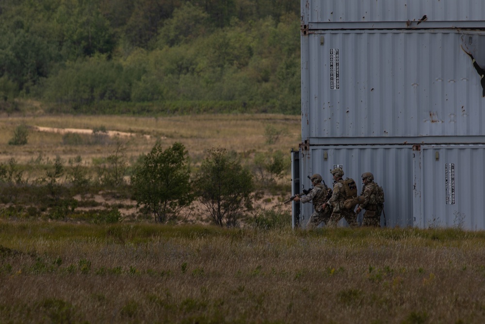 Special Forces team assaults compound, destroys targets, leaves