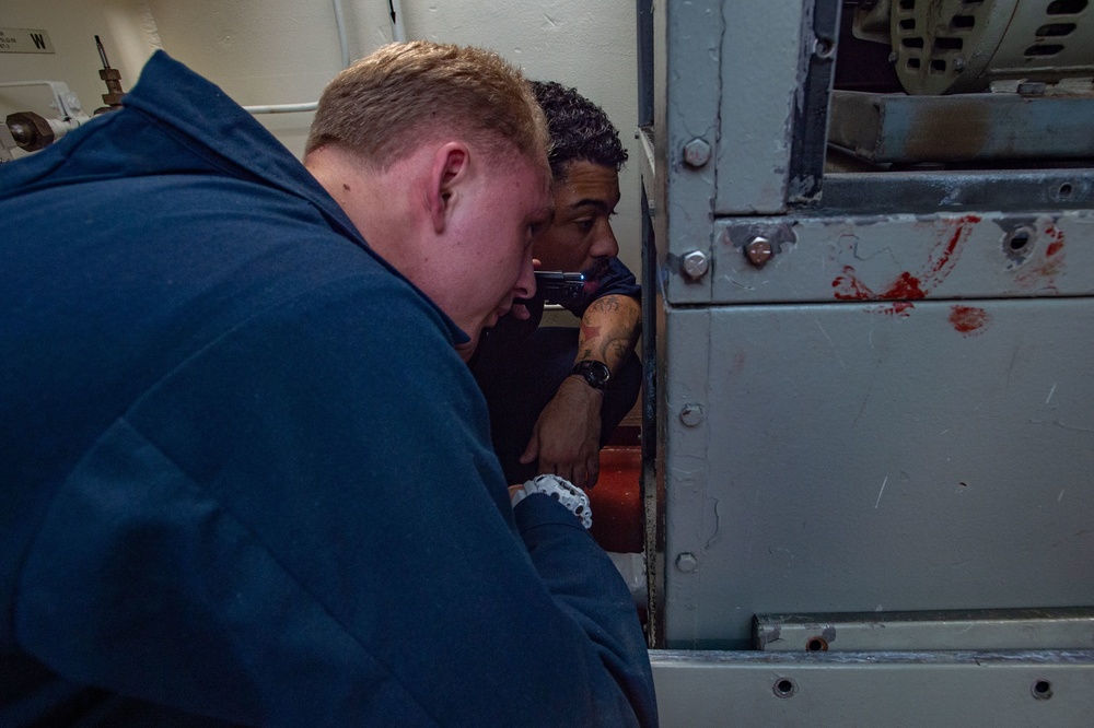 USS Ronald Reagan (CVN-76) Sailors perform maintenance