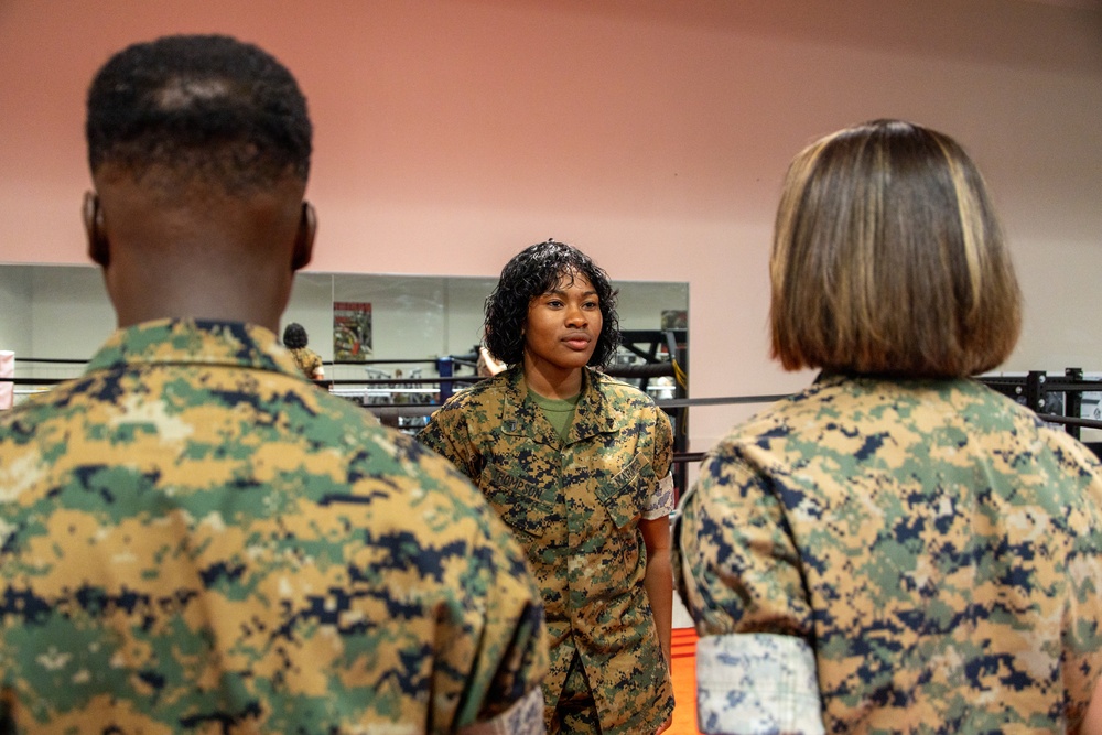 U.S. Marine reenlists as part of First Term Alignment Program