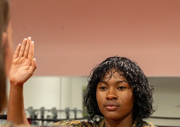 U.S. Marine reenlists as part of First Term Alignment Program