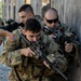 Pa. Guard Soldiers clear rooms during training at FTIG