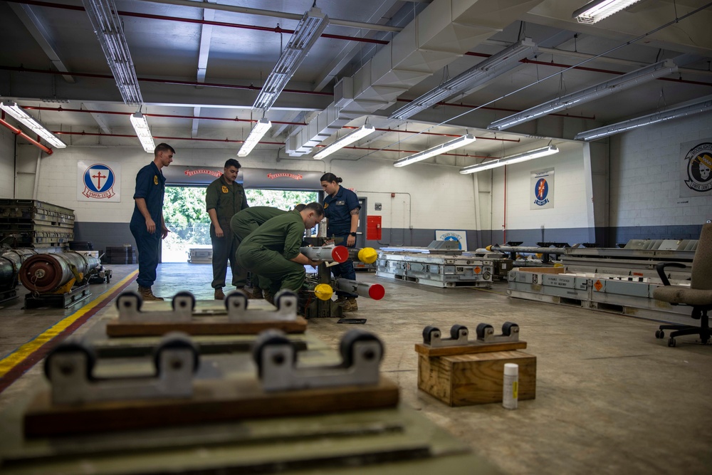 Marine Aviation Logistics Squadron 31 Ordnance deliver high explosive rounds for training