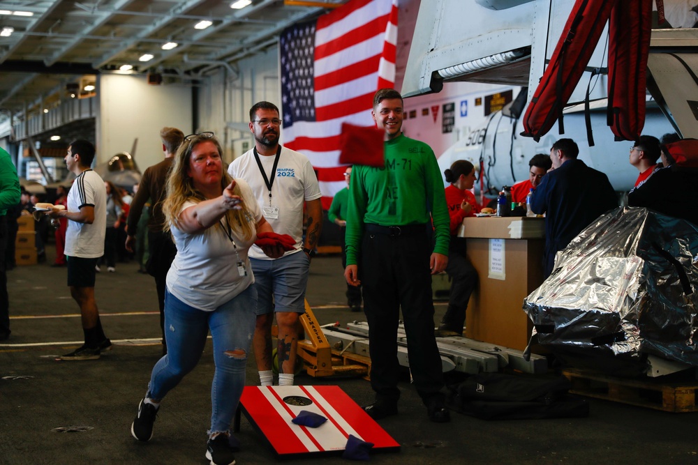 Abraham Lincoln embarked guests, Sailors, Marines participate in steel cave picnic