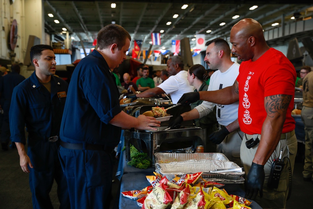 Abraham Lincoln embarked guests, Sailors, Marines participate in steel cave picnic