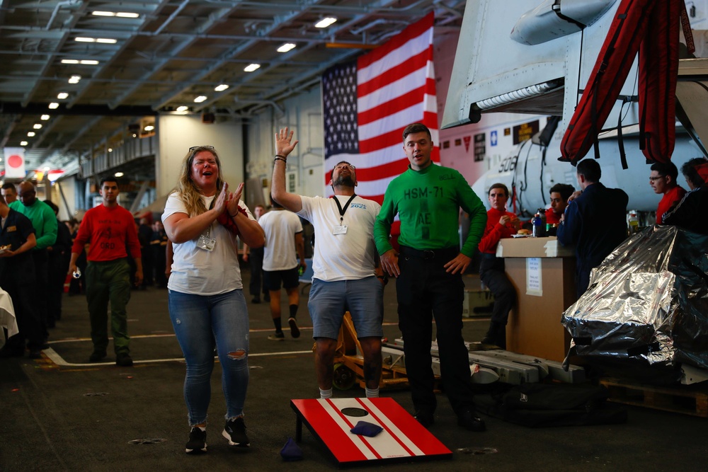 Abraham Lincoln embarked guests, Sailors, Marines participate in steel cave picnic