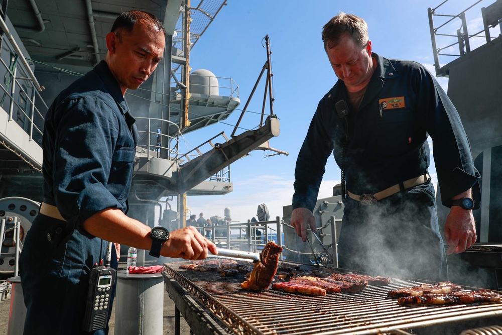 Abraham Lincoln embarked guests, Sailors, Marines participate in steel cave picnic