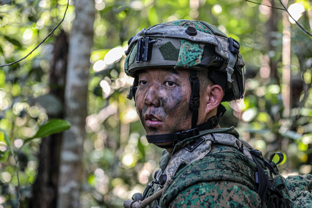 Soldiers from 3-25th Infantry Brigade Combat Team, Australian, Indonesian, and Singapore Army conduct field training exercise