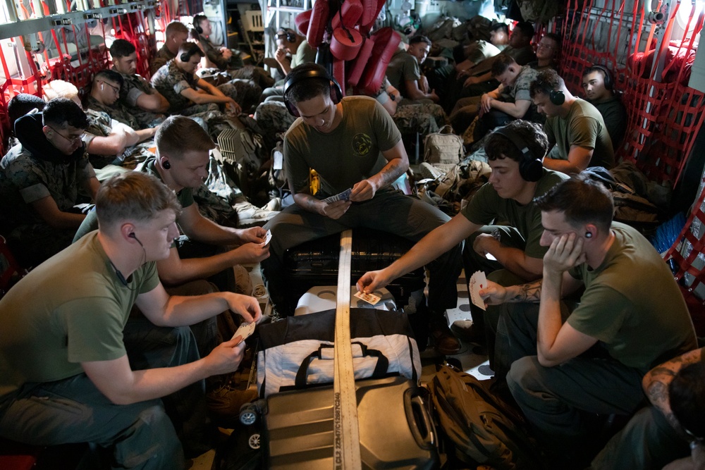 Marines pass the time on a KC-130J Hercules