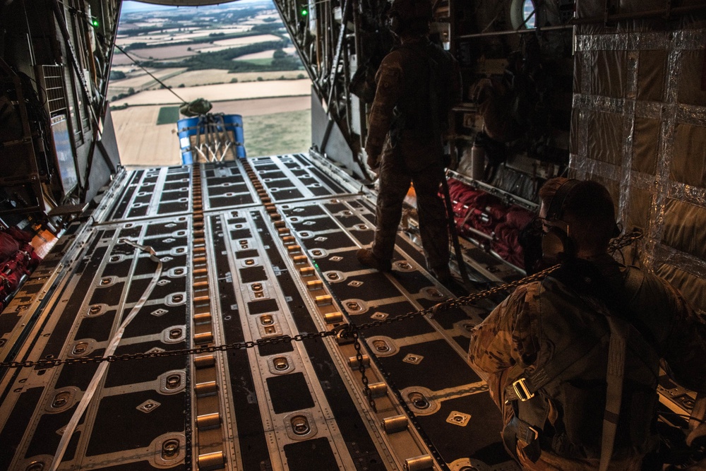 MC-130J Commando IIs conduct nighttime three-ship formation operations