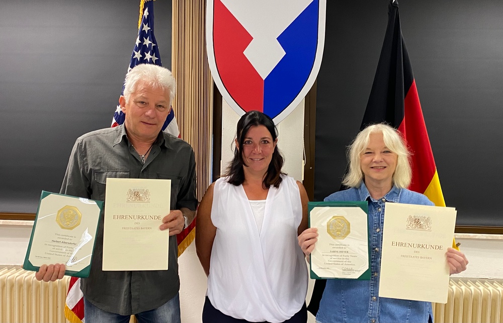 Two 405th AFSB BASOPS Maintenance employees recognized for 80 years combined service
