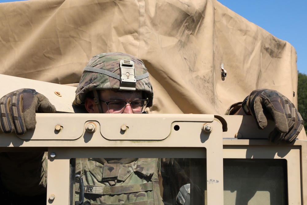 U.S. Army Spc. Jared Ritter, 1-134th Field Artillery Regiment, awaits confirmation on a &quot;march order&quot; at Northern Strike 22-2