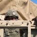 U.S. Army Spc. Jared Ritter, 1-134th Field Artillery Regiment, awaits confirmation on a &quot;march order&quot; at Northern Strike 22-2