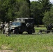 U.S. Army Soldiers, 1-134th Field Artillery Regiment, await confirmation to fire at Northern Strike 22-2