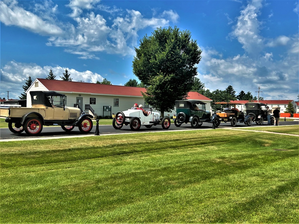 Model T Fords cruise through Fort McCoy's historic Commemorative Area