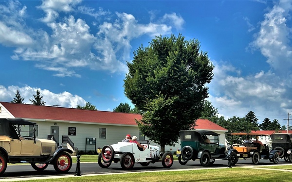 Model T Fords cruise through Fort McCoy's historic Commemorative Area