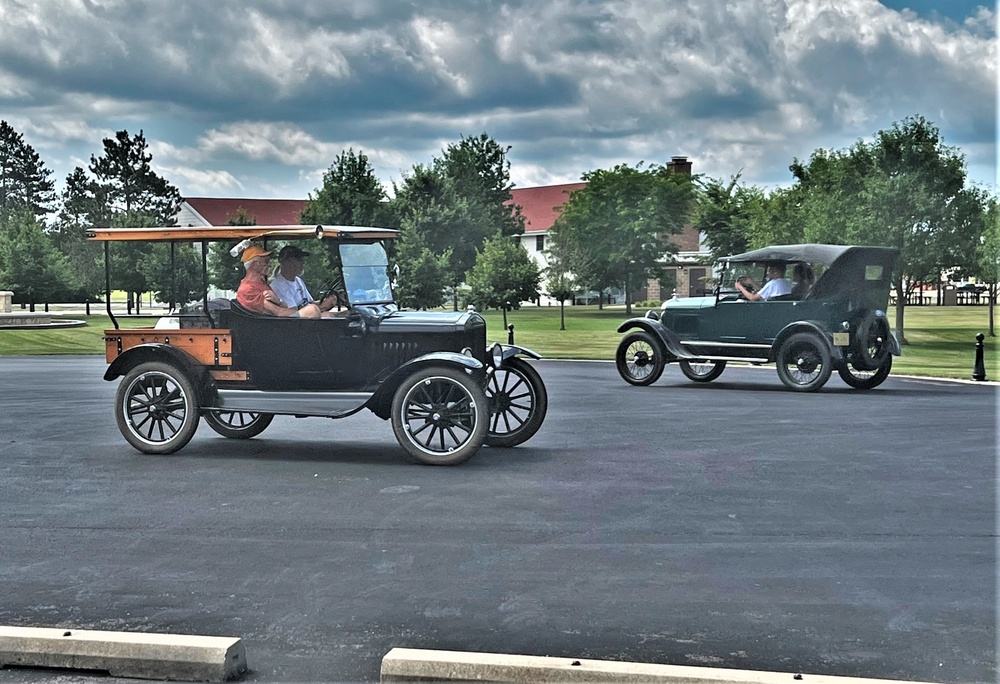 Model T Fords cruise through Fort McCoy's historic Commemorative Area