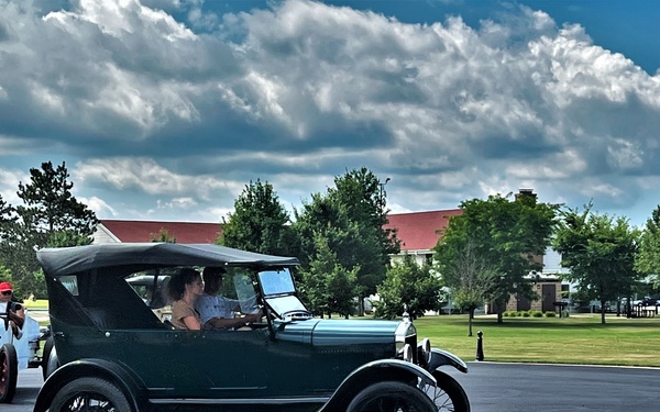 Model T Fords cruise through Fort McCoy's historic Commemorative Area