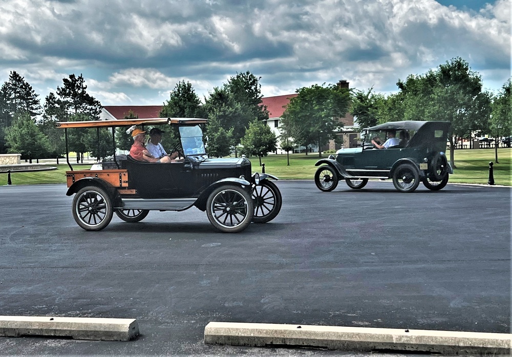 Model T Fords cruise through Fort McCoy's historic Commemorative Area