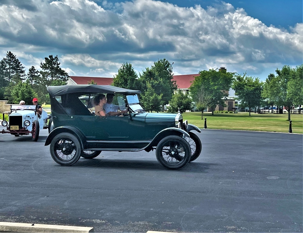 Model T Fords cruise through Fort McCoy's historic Commemorative Area