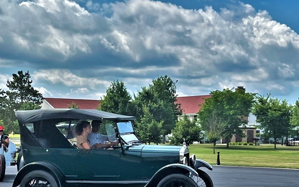 Model T Fords cruise through Fort McCoy's historic Commemorative Area