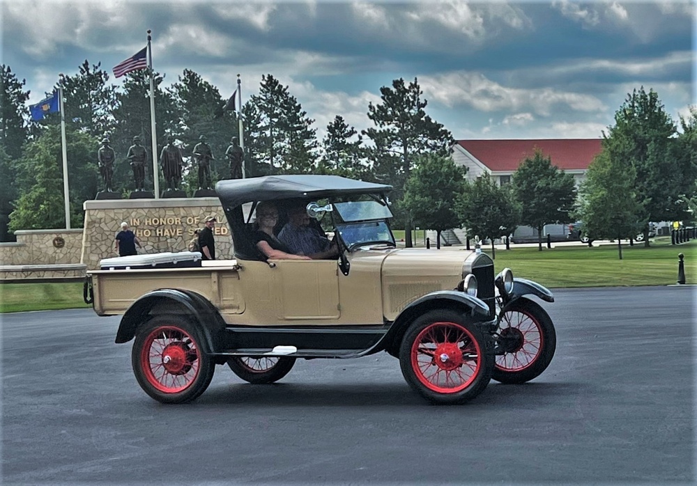Model T Fords cruise through Fort McCoy's historic Commemorative Area