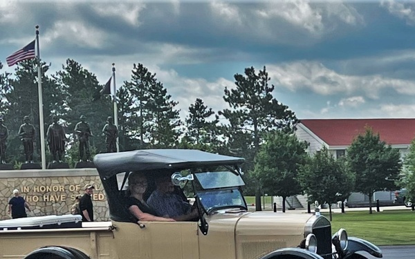 Model T Fords cruise through Fort McCoy's historic Commemorative Area