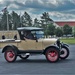 Model T Fords cruise through Fort McCoy's historic Commemorative Area