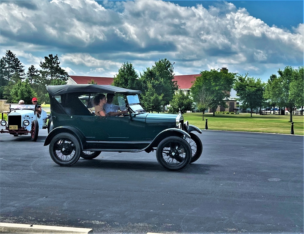 Model T Fords cruise through Fort McCoy's historic Commemorative Area