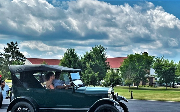 Model T Fords cruise through Fort McCoy's historic Commemorative Area