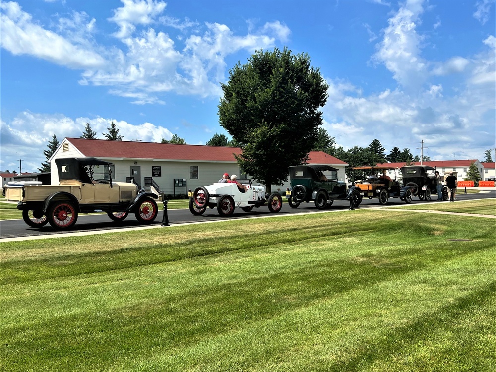 Model T Fords cruise through Fort McCoy's historic Commemorative Area