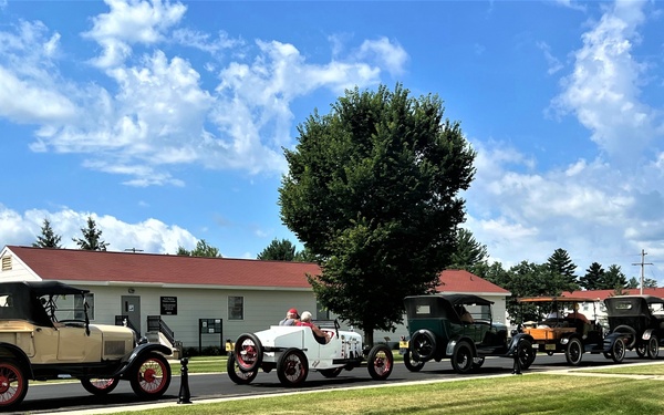 Model T Fords cruise through Fort McCoy's historic Commemorative Area
