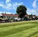 Model T Fords cruise through Fort McCoy's historic Commemorative Area