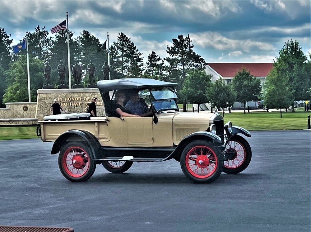 Model T Fords cruise through Fort McCoy's historic Commemorative Area