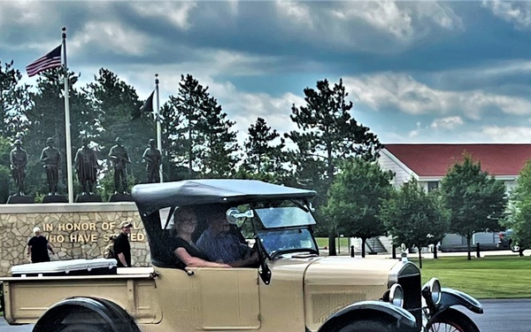 Model T Fords cruise through Fort McCoy's historic Commemorative Area