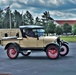 Model T Fords cruise through Fort McCoy's historic Commemorative Area