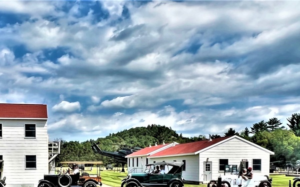 Model T Fords cruise through Fort McCoy's historic Commemorative Area