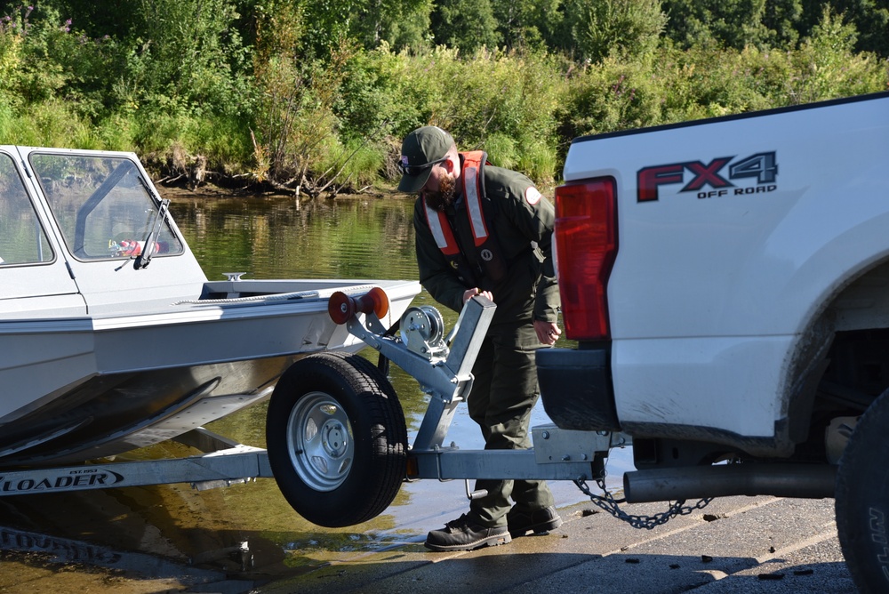 Park ranger unhitches boat at the northern-most USACE run flood control project