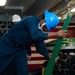 USS Ronald Reagan (CVN 76) Sailors conduct deck rigging maintenance