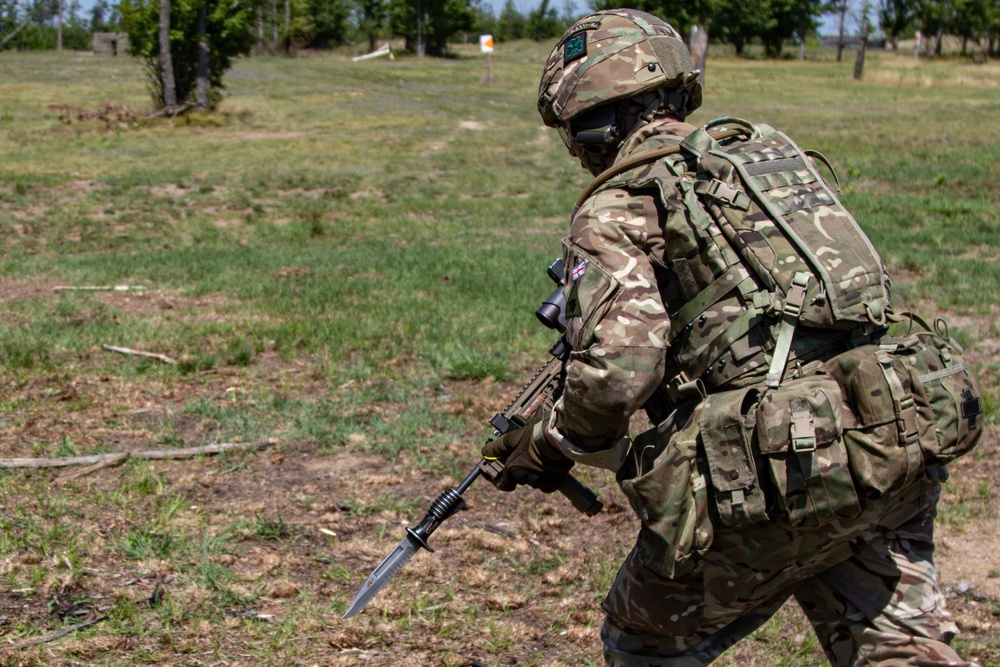 Irish Soldier charges with rifle sword at Northern Strike