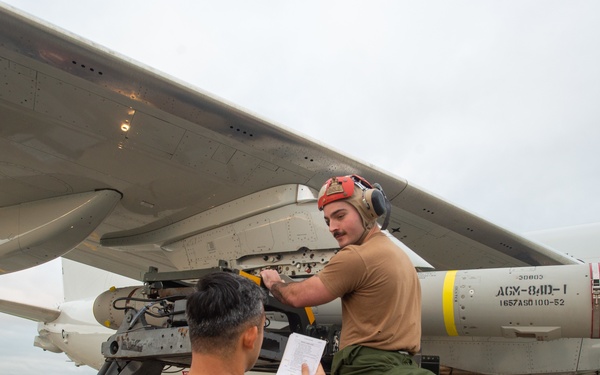 VP-8 Sailors load Harpoon on P-8A