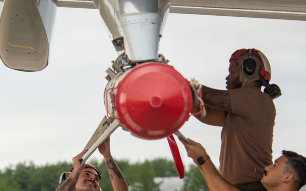 VP-8 Sailors Load Harpoon Missile on P-8A