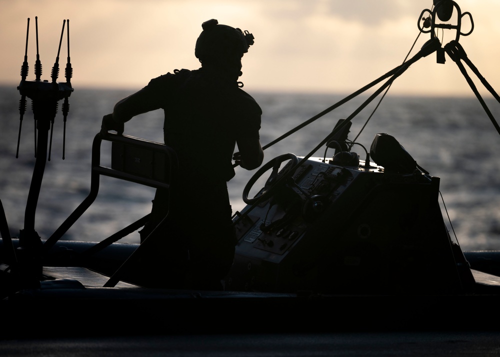 Sailors deploy small boats