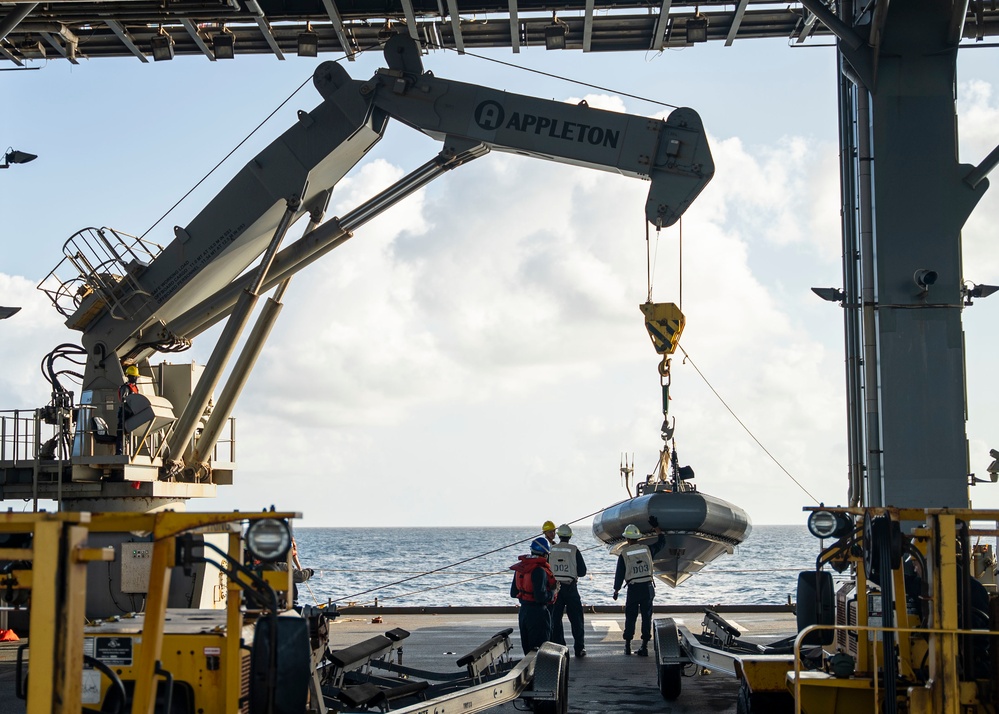 Sailors deploy small boats